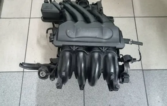 Volkswagen Golf IV Intake manifold 06A133205AT