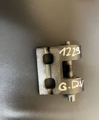Rear door upper hinge