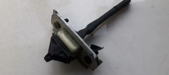 Mazda 323 F Front door check strap stopper 