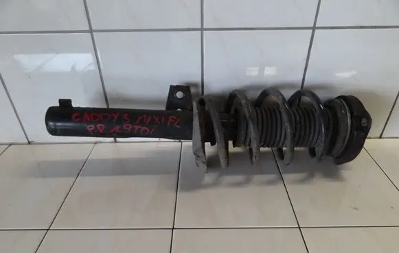 Volkswagen Caddy Front shock absorber with coil spring