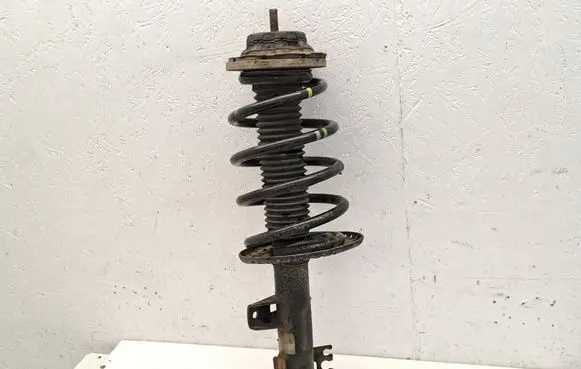 Volkswagen Transporter - Caravelle T5 Front shock absorber with coil spring 7H0413031N