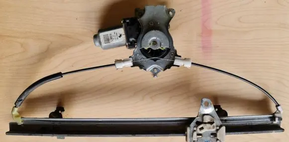Nissan Almera Tino Front door window regulator with motor 400698T1