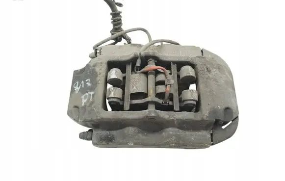 Volkswagen Touareg I Front brake caliper 