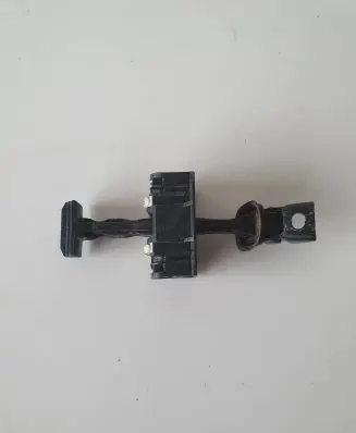 Front door check strap stopper