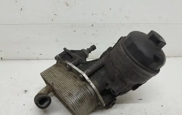 Opel Astra J Oil filter mounting bracket 55577343 Y2523001 1075513S01