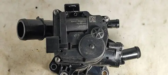 Thermostat/thermostat housing