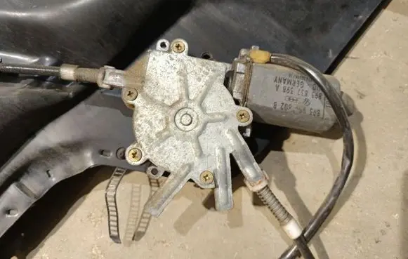 Front door window regulator motor