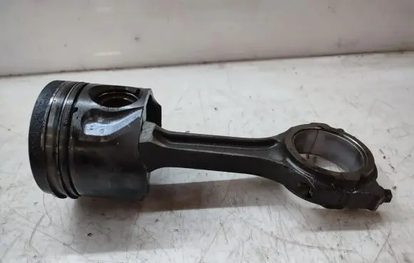 Piston with connecting rod