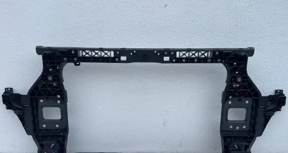Radiator support slam panel