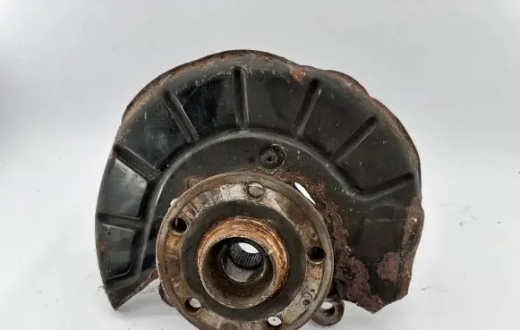 Volkswagen Touran I Front wheel hub spindle knuckle 1k0407256a