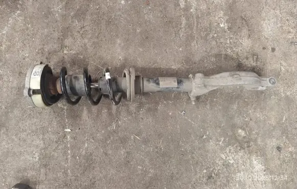 Front shock absorber with coil spring