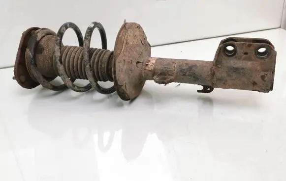 Toyota Avensis T250 Front shock absorber with coil spring