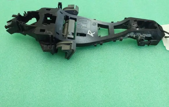 Jaguar F-Pace Rear door exterior handle/bracket BJ32224N02