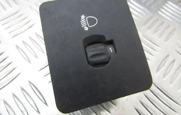 Headlight level height control switch