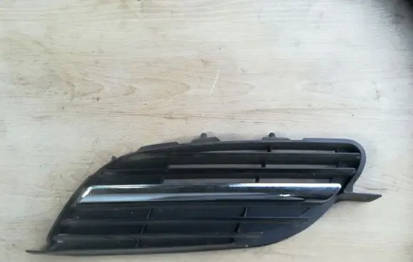 Nissan Almera Tino Front bumper lower grill 62317BU100