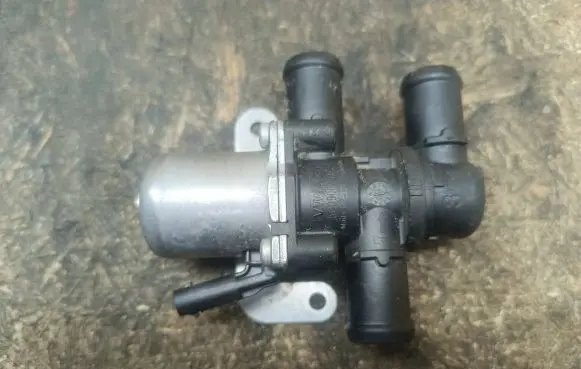 Coolant heater control valve