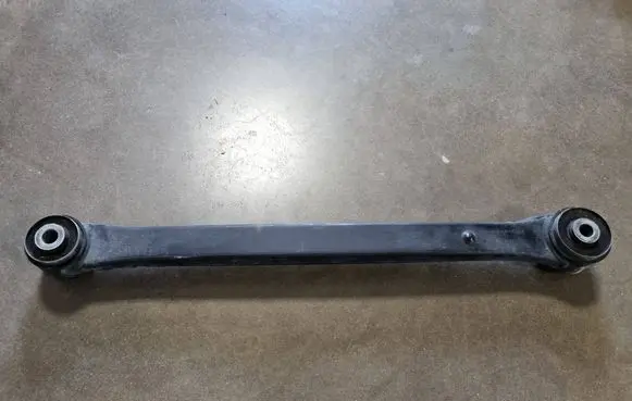 Ram 1500 Rear control arm 68264947AA P68264947AA