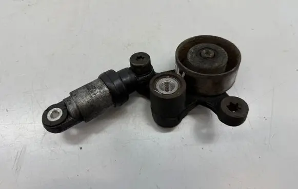Generator/alternator belt tensioner