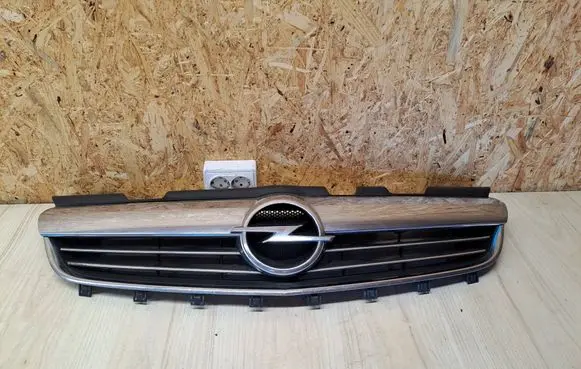 Opel Zafira B Front bumper upper radiator grill 13247331