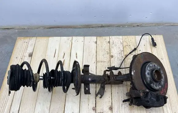 Renault Clio IV Front shock absorber with coil spring