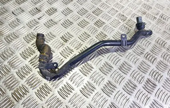 Volkswagen PASSAT B7 Engine coolant pipe/hose 5N0121065 1K0121101CP