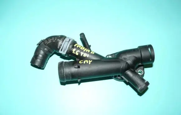 Volkswagen Golf VI Engine coolant pipe/hose 03L121131AA
