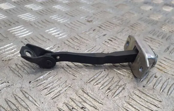 Front door check strap stopper