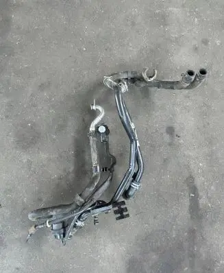 Volkswagen Touareg II Engine coolant pipe/hose 7P6121070BD
