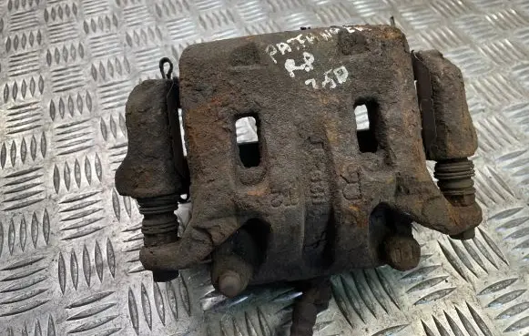 Nissan Pathfinder R51 Front brake caliper