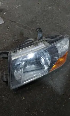 Mitsubishi Pajero Headlight/headlamp 10087419