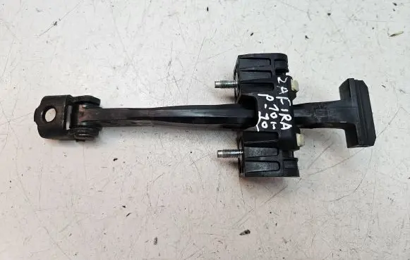 Front door check strap stopper