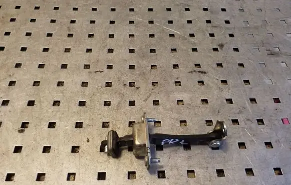 Front door check strap stopper