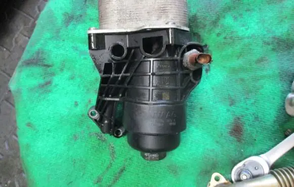 Skoda Octavia Mk3 (5E) Oil filter mounting bracket 03N115389A