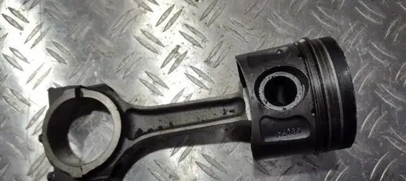 Piston with connecting rod