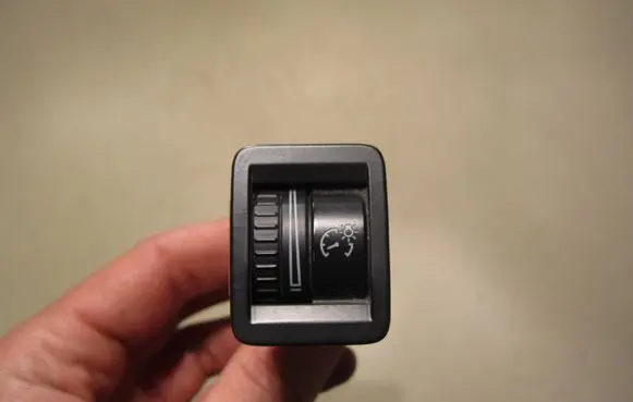 Panel lighting control switch