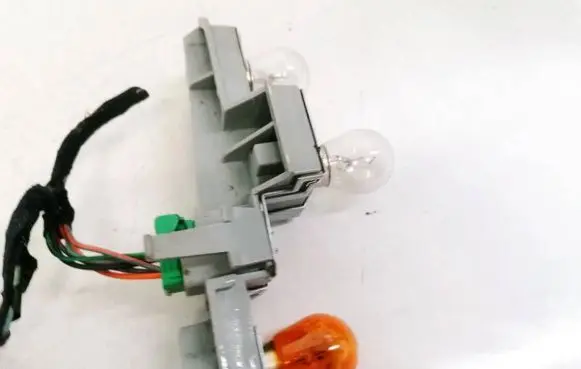 Volvo C30 Tail light bulb cover holder