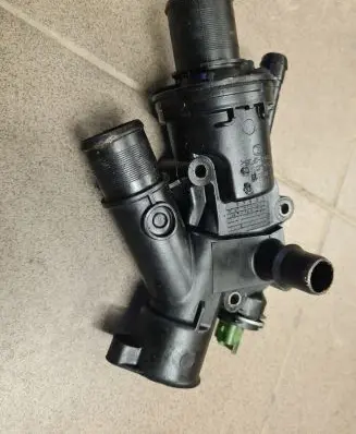 Thermostat/thermostat housing