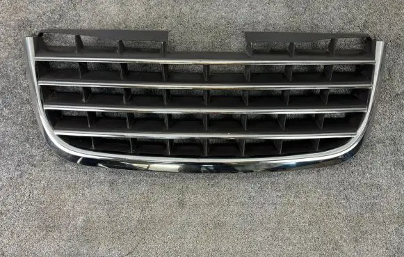 Chrysler Voyager Front bumper upper radiator grill 05113127AA K3091