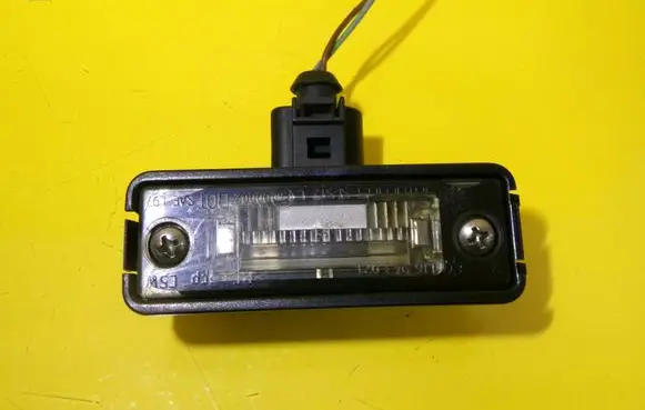 Volkswagen Golf IV Number plate light 1J6943021