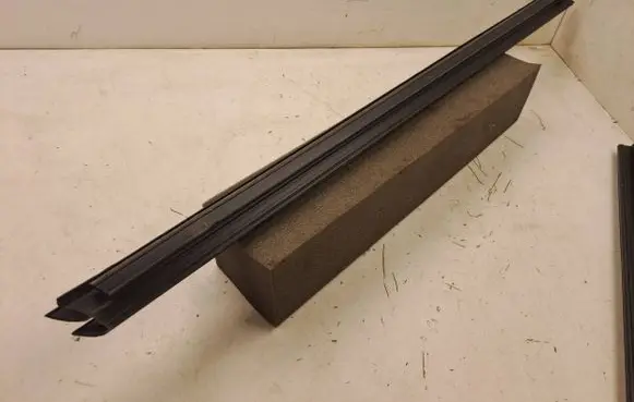 Front door glass trim molding