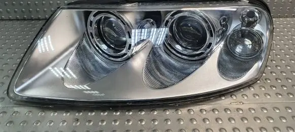 Volkswagen Touareg I Headlight/headlamp 7L6941015AP