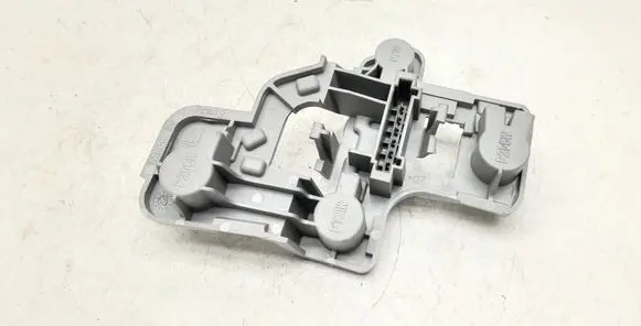 Tail light bulb cover holder