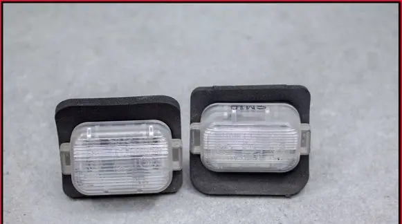 Mazda 3 II Number plate light