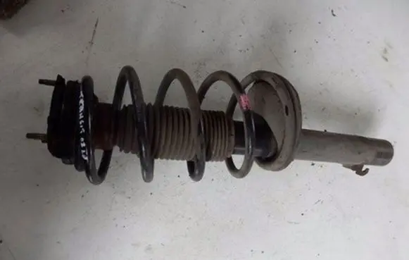 Front shock absorber with coil spring