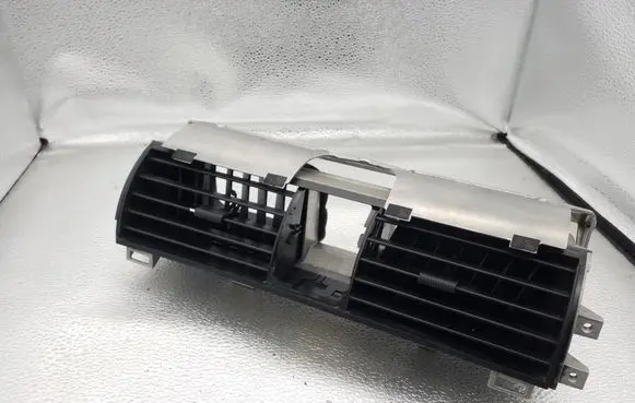 Dash center air vent grill