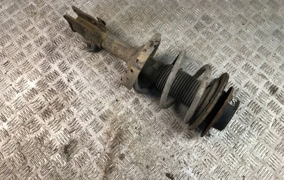 Subaru Impreza III Front shock absorber with coil spring 20310FG230