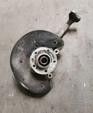 Front wheel hub spindle knuckle