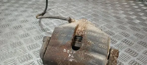Volkswagen Golf V Front brake caliper 