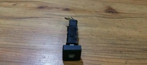 KIA Carens I Windscreen/window heater switch