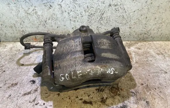Volkswagen Golf VII Front brake caliper